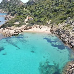 Aparthotel In With Swimming Pool In Cala Girgolu, Monte Petrosu